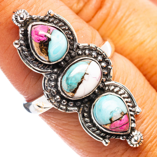 Sterling silver turquoise ring, ornate bezel, three oval stones with pink and aqua accents, 8.25