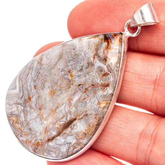 Silver-plated lace agate teardrop pendant with silver bail loop