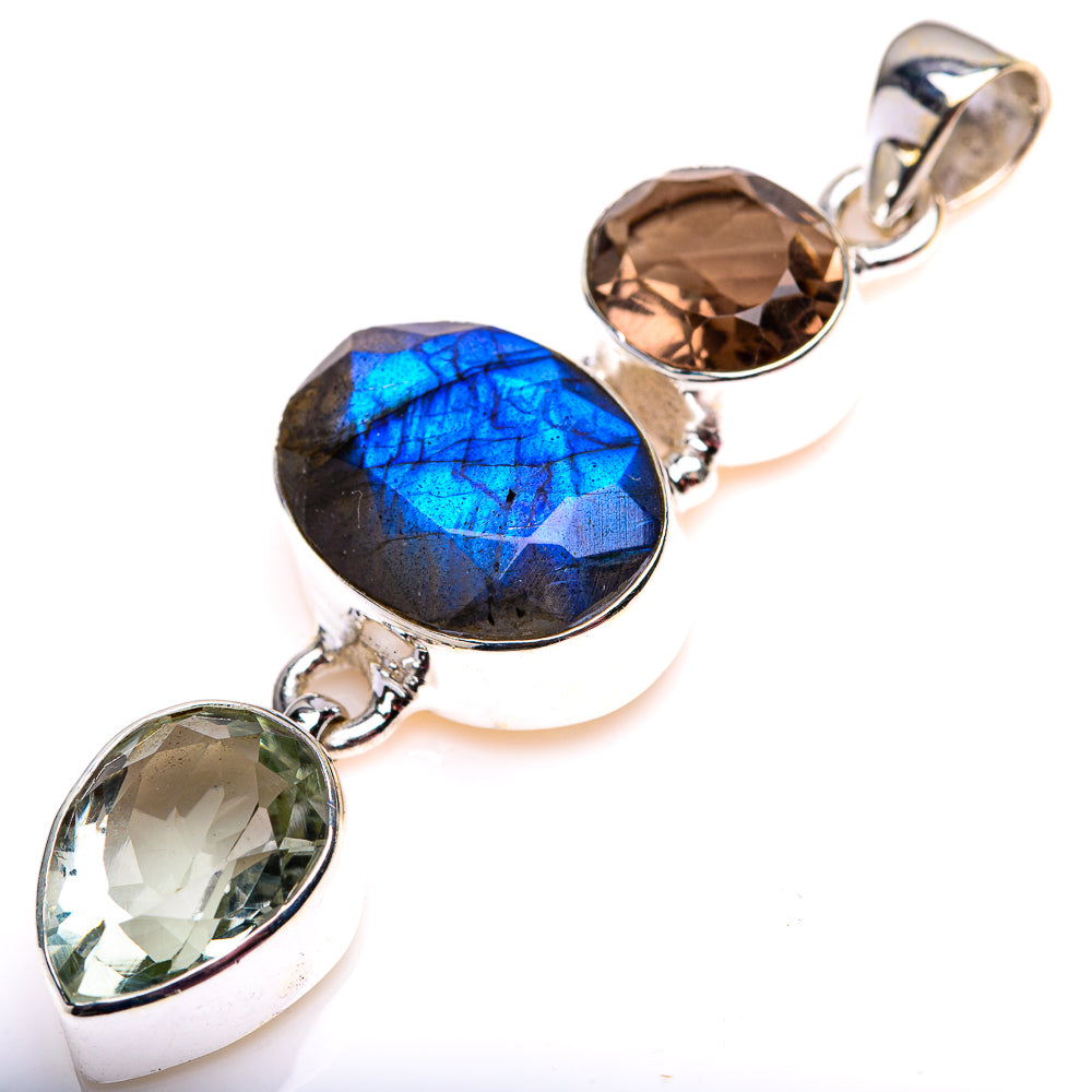 Sterling silver gemstone pendant with blue oval labradorite, dark brown and green stones