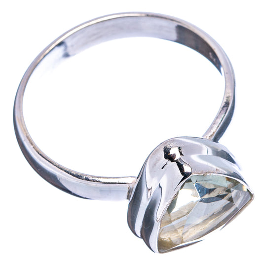 Sterling silver ring with faceted pear-shaped gemstone, side view of band and bezel