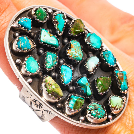 Close-up turquoise and green gemstone inlay on adjustable sterling silver ring