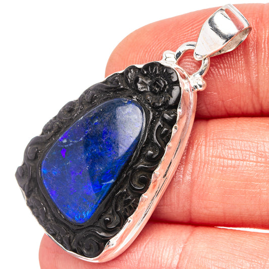 925 sterling silver opal pendant, blue oval stone in ornate black bezel
