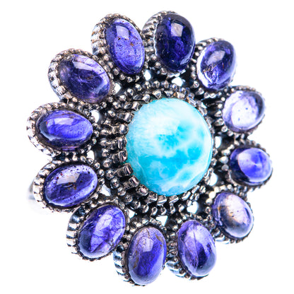 Sterling silver statement ring with round light-blue larimar cabochon and purple gemstones