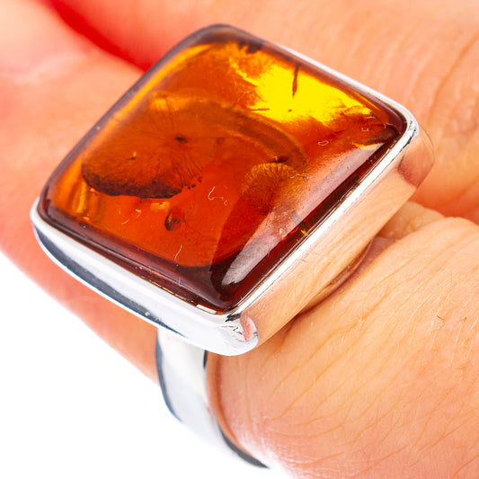Adjustable .925 sterling silver ring with dark amber square cabochon