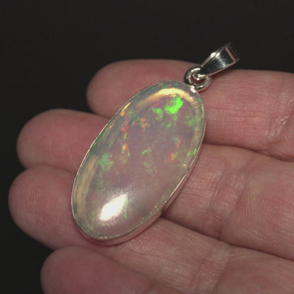 17.65ct Ethiopian Water Opal Pendant 2" (.925 Sterling Silver)