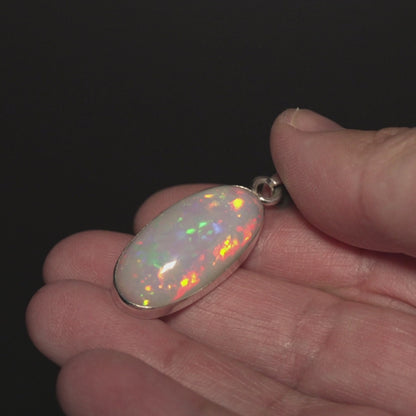 14.95ct Ethiopian Opal Pendant 1 3/4" (.925 Sterling Silver)