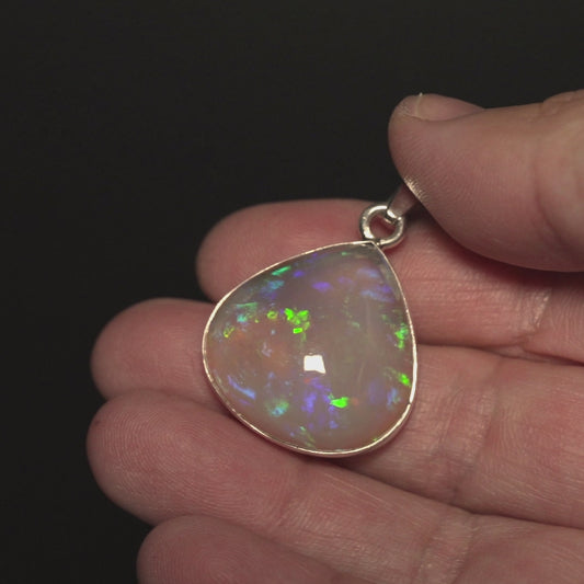23.5ct Ethiopian Water Opal Pendant 1 1/2" (.925 Sterling Silver)