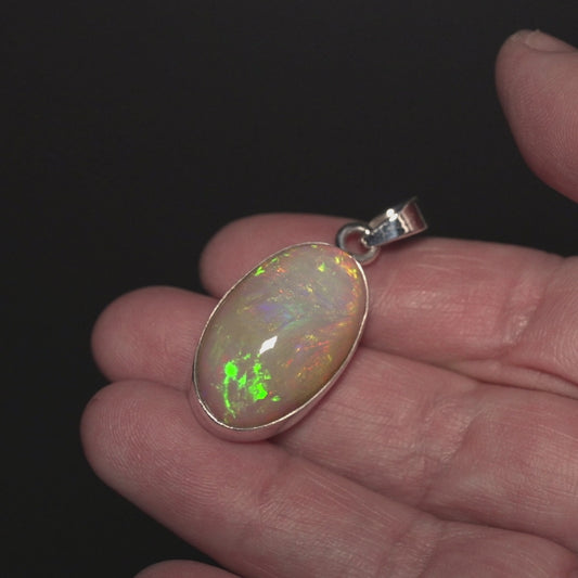 26.85ct Ethiopian Opal Pendant 1 1/2" (.925 Sterling Silver)