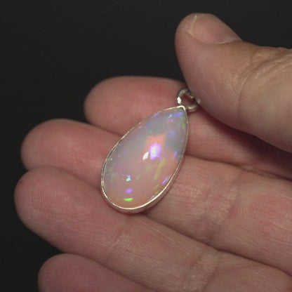 12.35ct Ethiopian Water Opal Pendant 1 1/2" (.925 Sterling Silver)