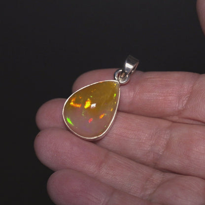 19.95ct Ethiopian Opal Pendant 1 1/2" (.925 Sterling Silver)