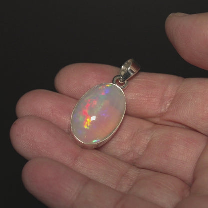 21.5ct Ethiopian Water Opal Pendant 1 1/2" (.925 Sterling Silver)