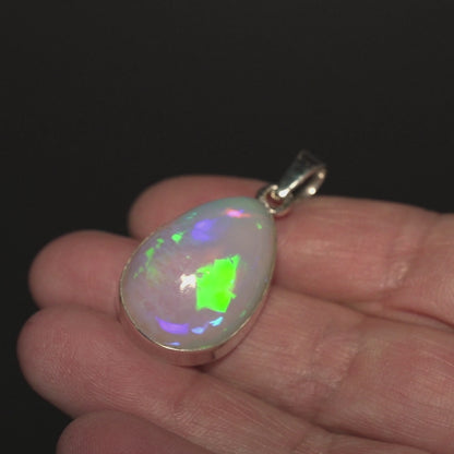 25.45ct Ethiopian Water Opal Pendant 1 1/2" (.925 Sterling Silver)