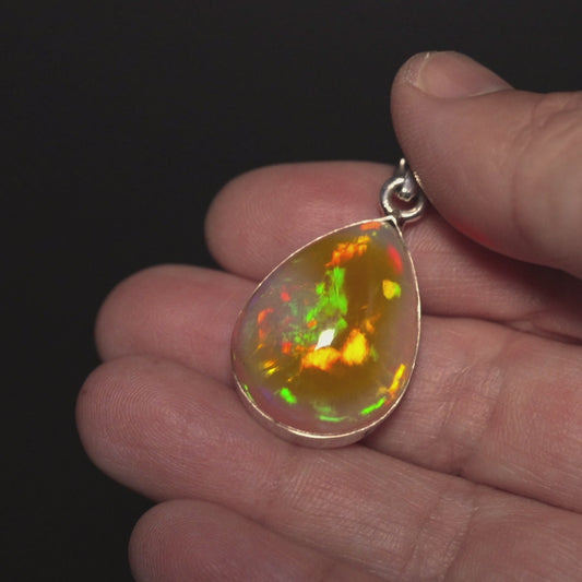 27.3ct Ethiopian Opal Pendant 1 1/2" (.925 Sterling Silver)