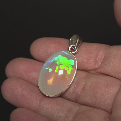 26.8ct Ethiopian Water Opal Pendant 1 1/2" (.925 Sterling Silver)