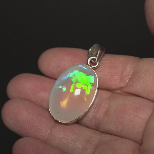 26.8ct Ethiopian Water Opal Pendant 1 1/2" (.925 Sterling Silver)