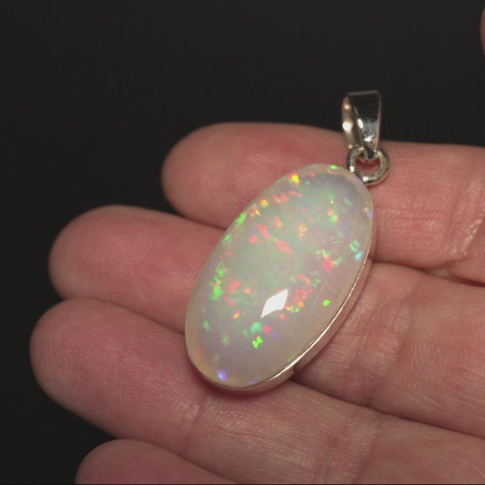 33.65ct Ethiopian Opal Pendant 1 3/4" (.925 Sterling Silver)