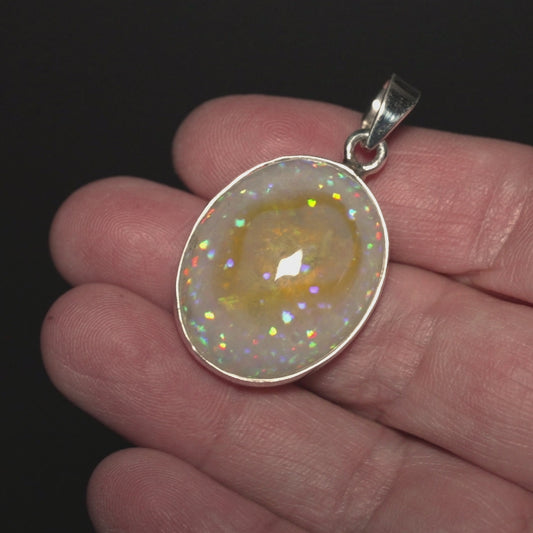 28.3ct Ethiopian Opal Pendant 1 1/2" (.925 Sterling Silver)