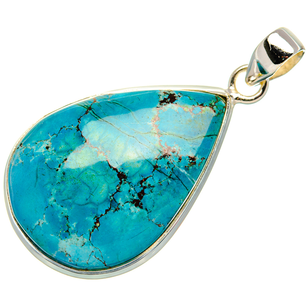 Teardrop turquoise pendant with sterling silver edge and small loop bail.