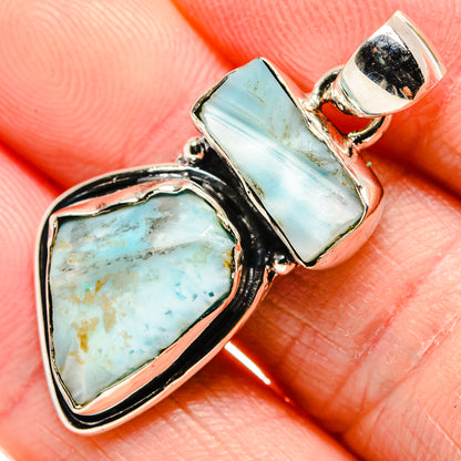Rough aquamarine pendant with teardrop stone, rectangular bail, sterling silver bezel