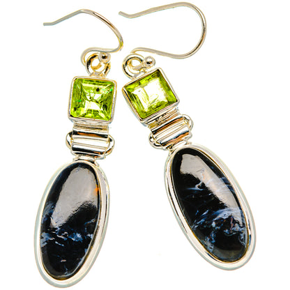 Silver fishhook drop earrings with green square tops and black oval teardrop stones