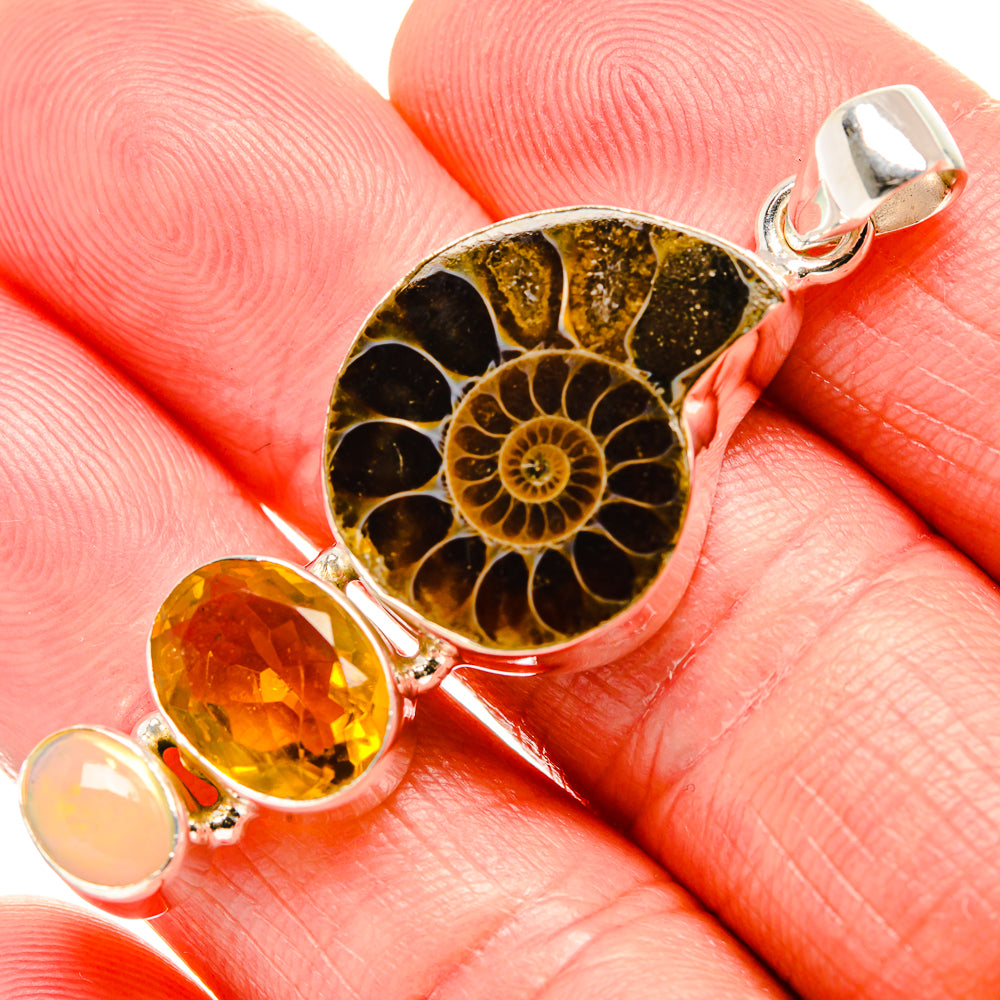 925 sterling silver ammonite fossil pendant with oval citrine and pale opalescent stone