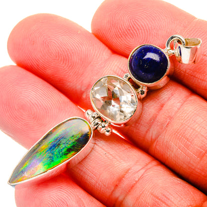 Sterling silver pendant: lapis round, clear quartz, and iridescent opal leaf