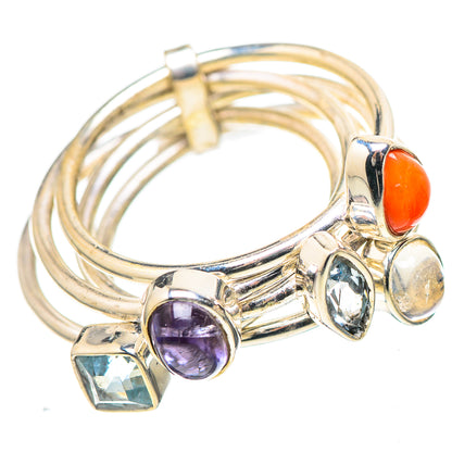 Sterling silver multi-gem ring with orange coral, blue stones, and purple plus yellow cabochon