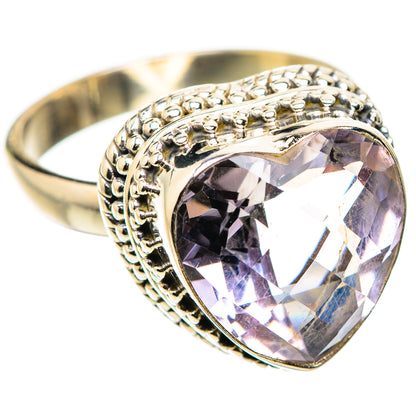 Sterling silver heart-cut amethyst ring, side view of faceted gemstone bezel