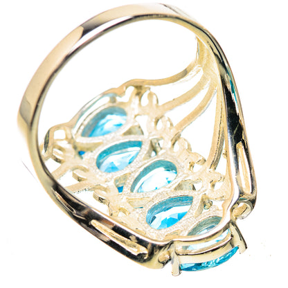 925 sterling silver ring with blue topaz stones on inside lattice prongs