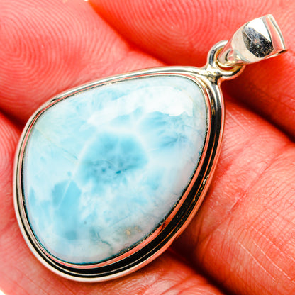 Oval larimar cabochon pendant in polished 925 sterling silver setting with bail