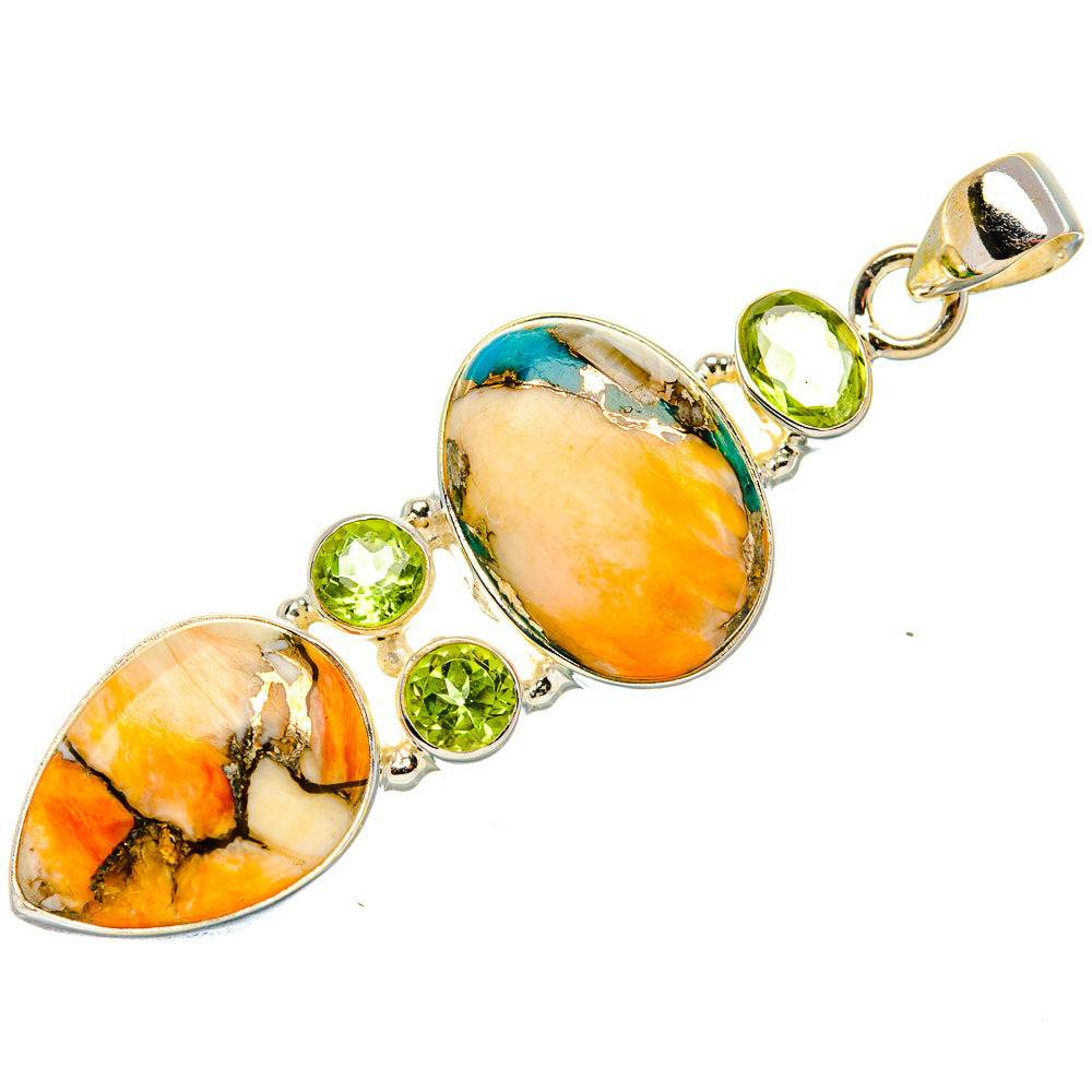 Spiny oyster turquoise sterling silver pendant with three green peridot-style stones.