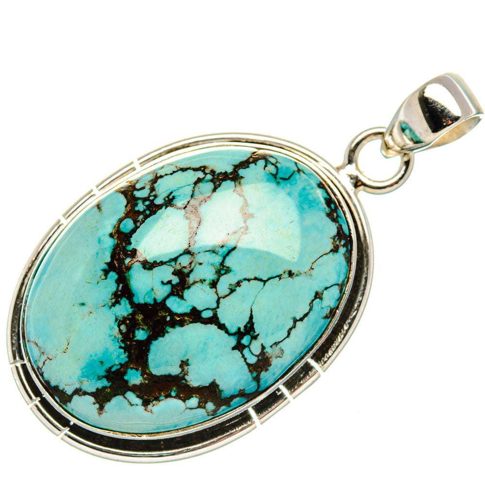 Sterling silver turquoise cabochon pendant, oval with metal bail and dark matrix