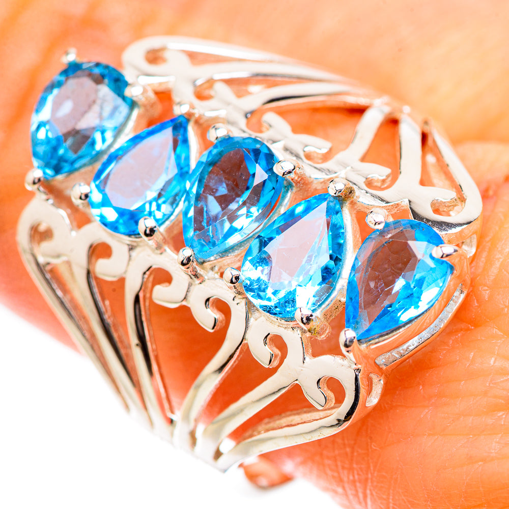 925 sterling silver ring with multiple blue topaz stones and ornate openwork setting