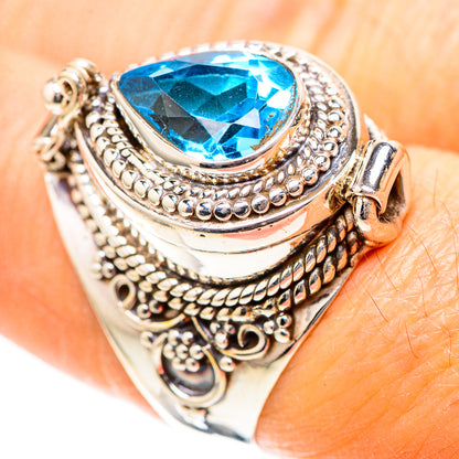 Sterling silver ring with pear-cut blue topaz-style stone and ornate filigree bezel, size 8