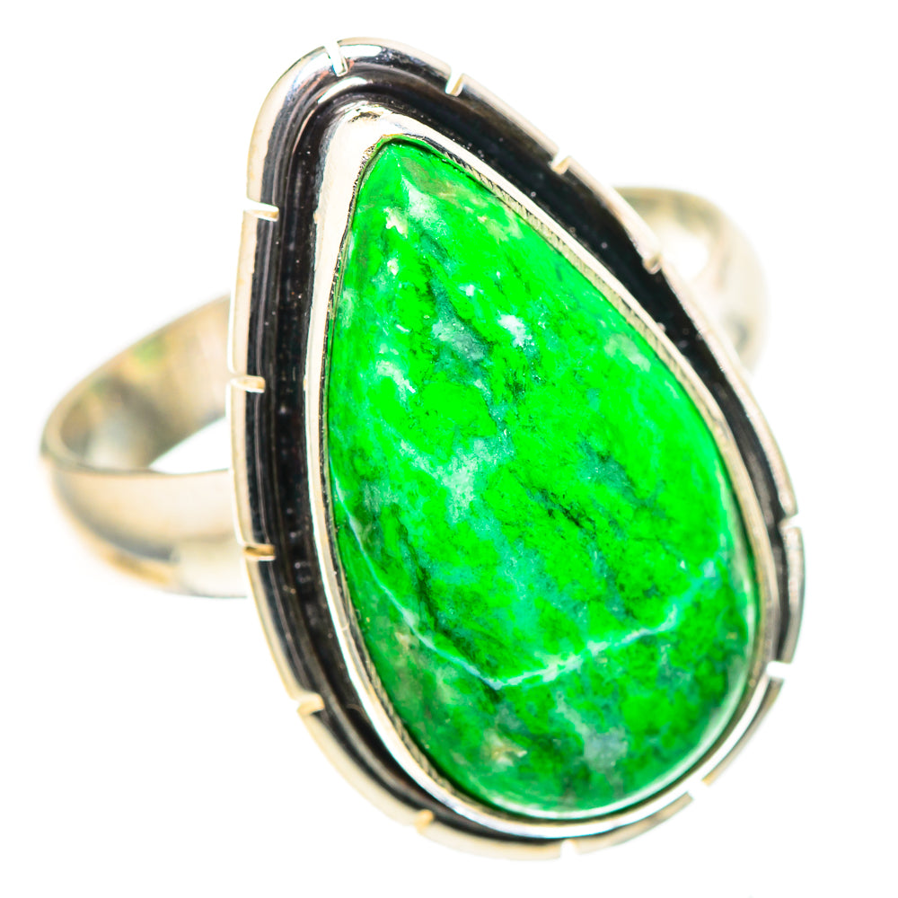 Sterling silver ring featuring oval green Maw Sit Sit stone with dark bezel and side prongs