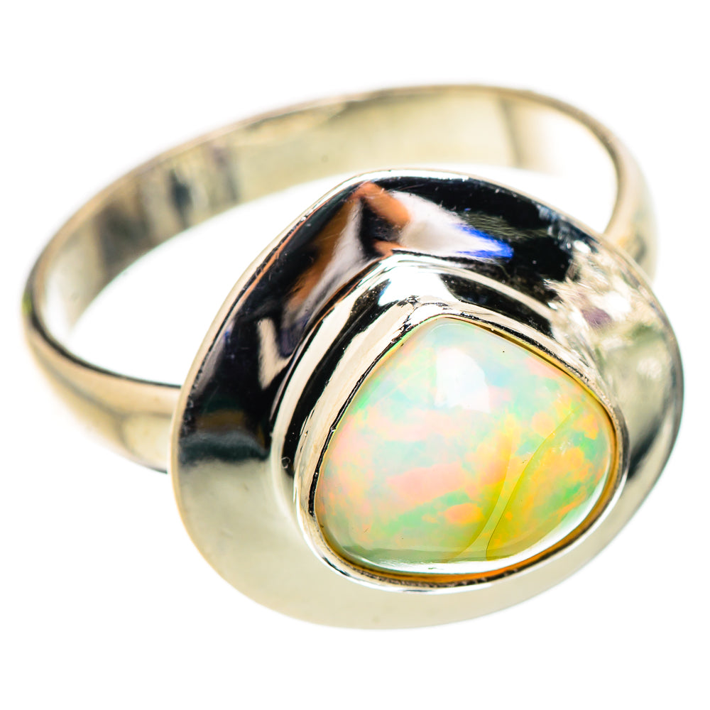 Sterling silver open bezel ring with oval iridescent opal cabochon