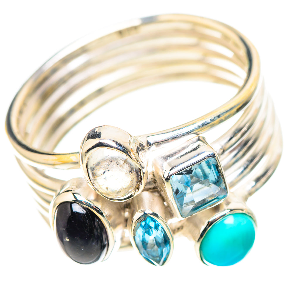 Sterling silver ring with black onyx, blue topaz, round white stone and turquoise accents