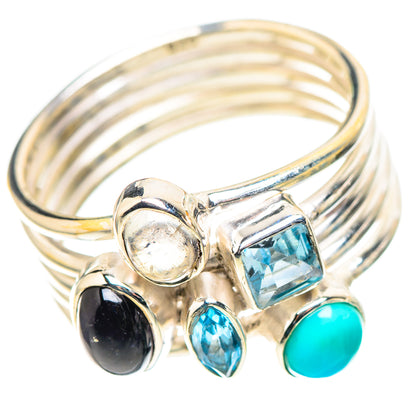 Sterling silver ring with black onyx, blue topaz, round white stone and turquoise accents