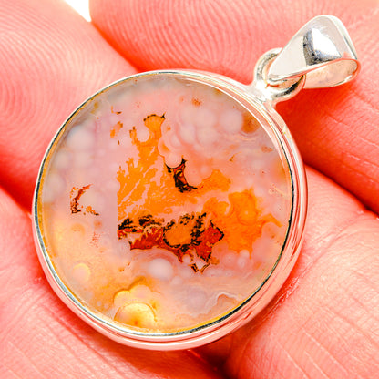 Dendritic agate pendant in sterling silver, round pink-orange stone with dark dendrites