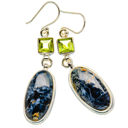 Sterling silver earrings with green square top stones and blue oval pietersite drops.