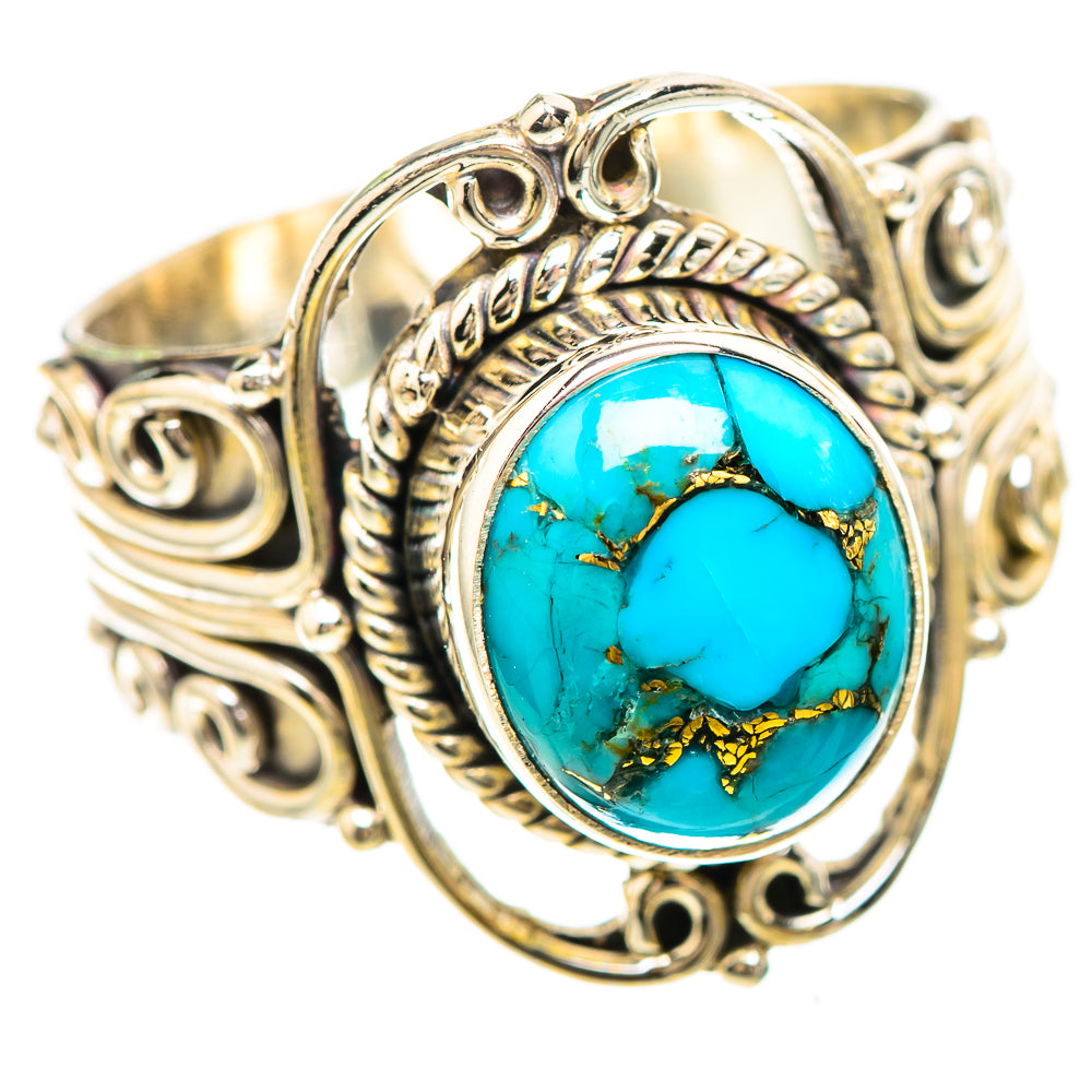 Turquoise oval cabochon sterling silver ring with engraved scrollwork settings