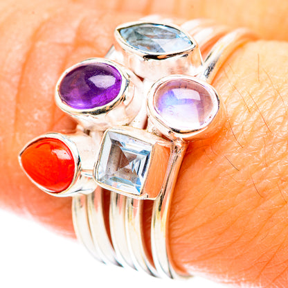 Sterling silver multi-stone ring with oval purple, blue, red cabochons and clear square