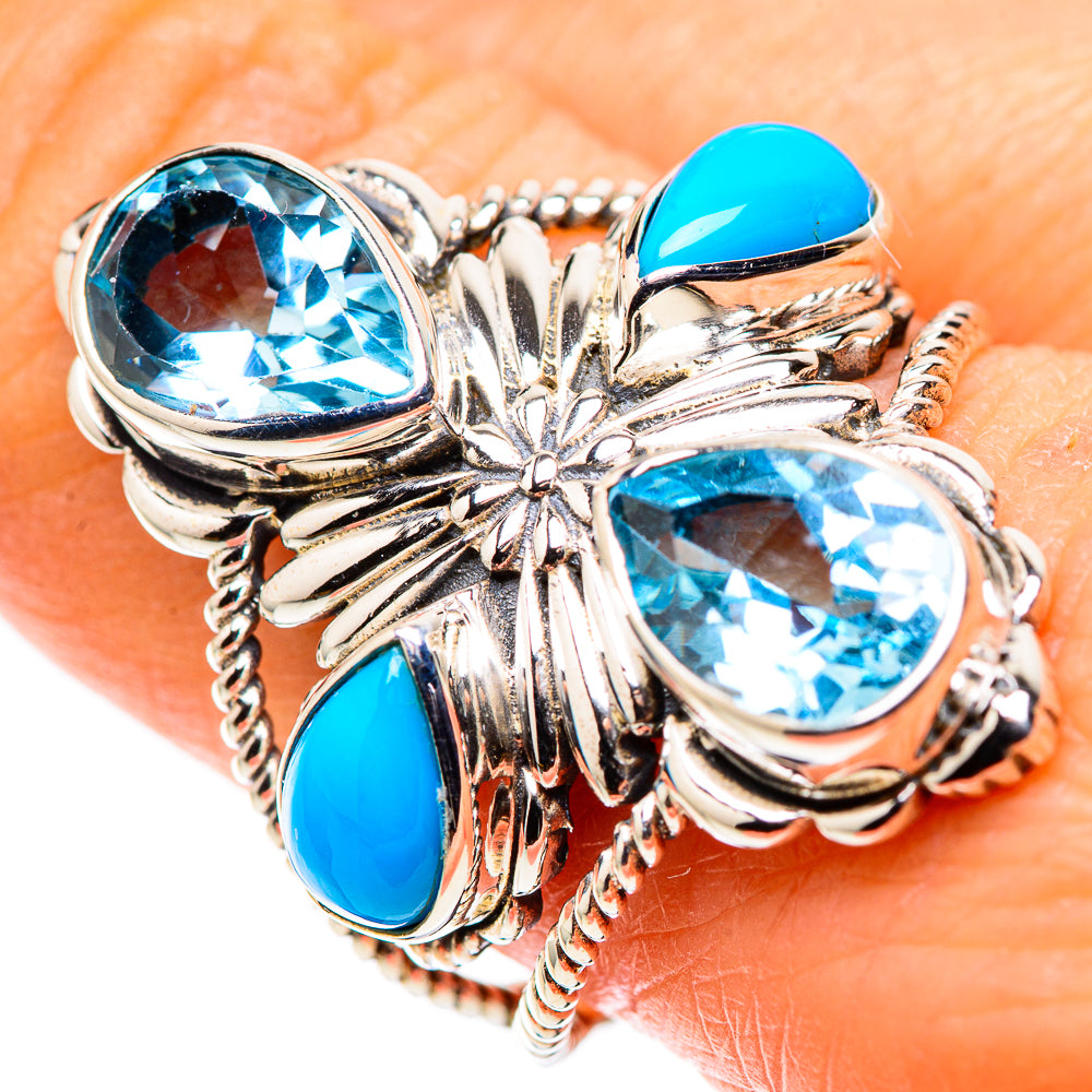 Sterling silver ring with large oval blue topaz, turquoise inlays, floral swirl design
