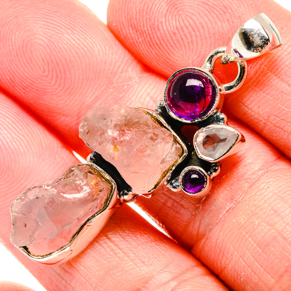 Sterling silver pendant with rough rose quartz, round amethyst, and clear faceted stones