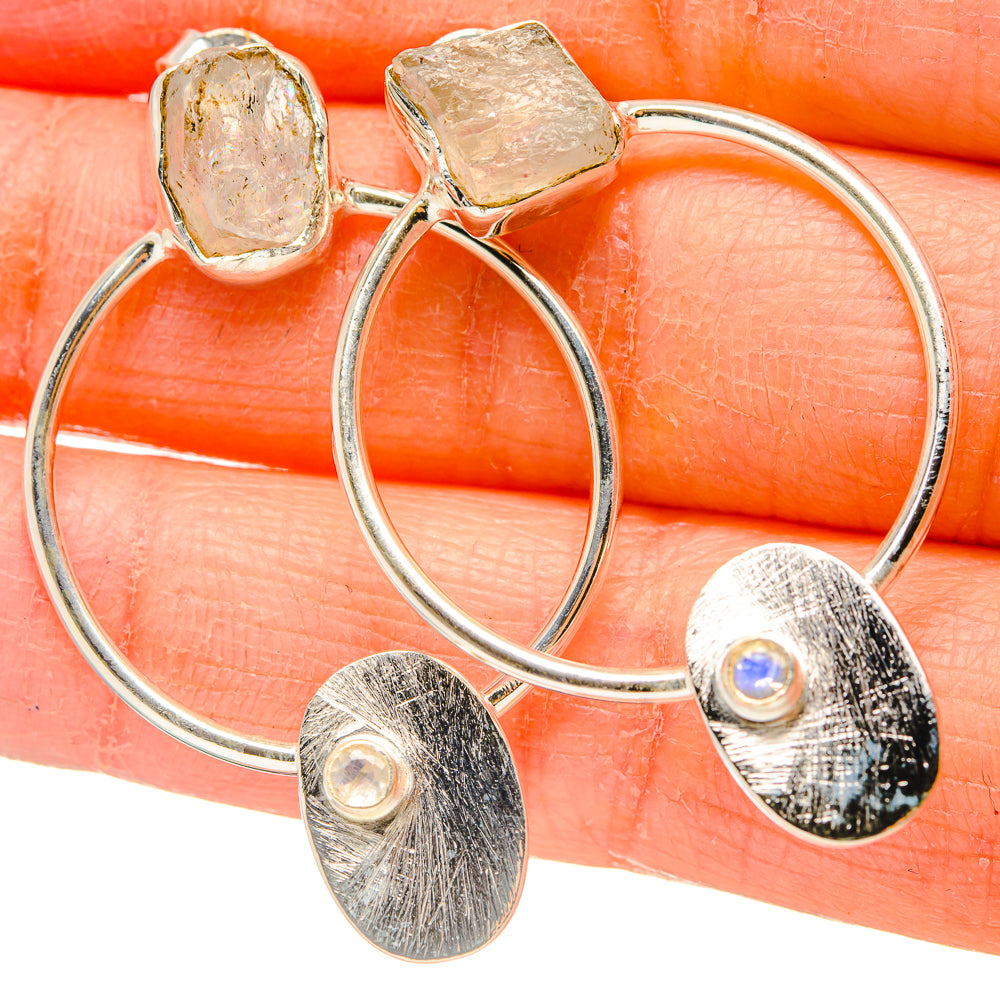Sterling silver hoop earrings with square-set rough moonstone and two oval textured charms
