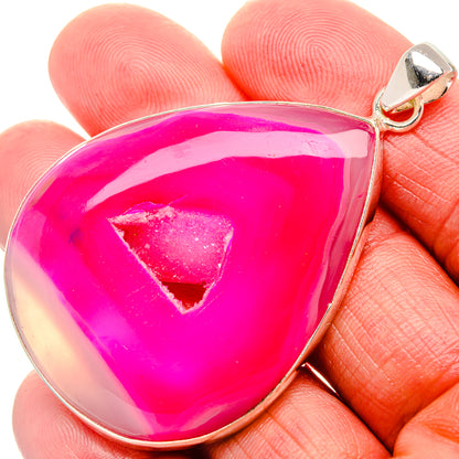 Pink window druzy pendant, teardrop pink stone in 925 sterling silver bail on hand.