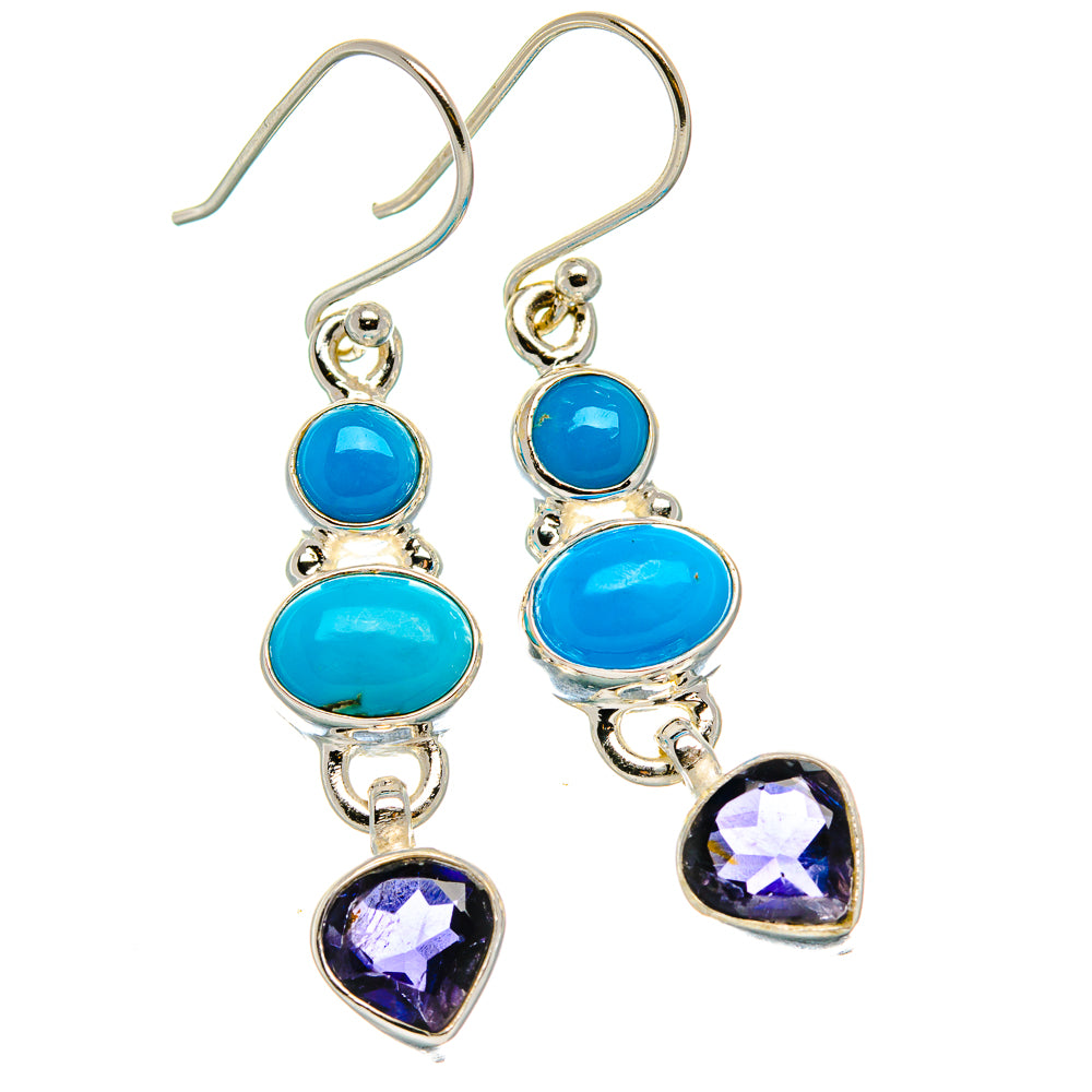 Sterling silver drop earrings with blue oval stones and faceted purple heart dangles