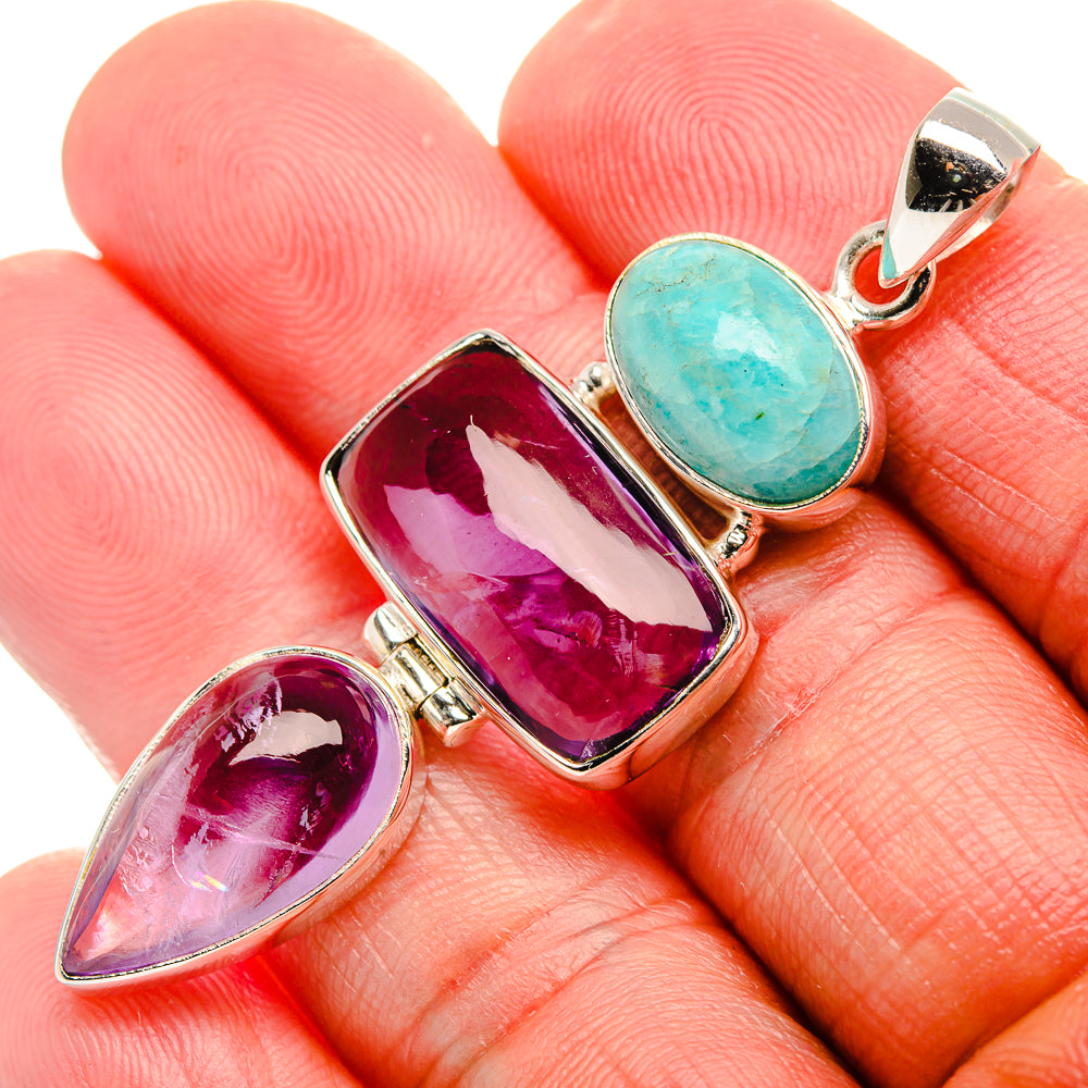 Sterling silver pendant close-up with purple amethyst and blue-green amazonite stones in bezel