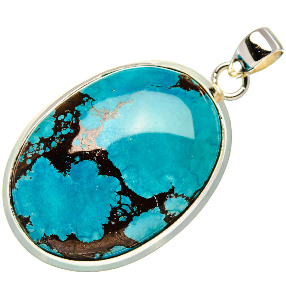Oval turquoise pendant in silver setting with top bail loop and natural stone matrix