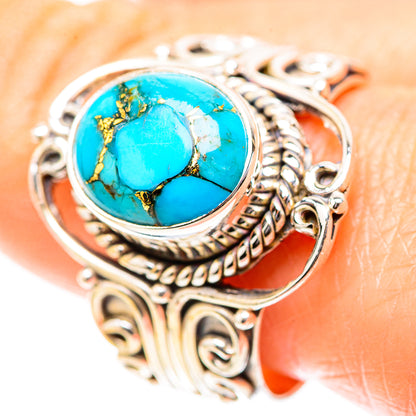 Turquoise oval cabochon sterling silver ring with ornate filigree bezel